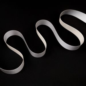 Self-adhesive reflector ribbon