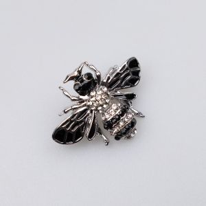 Brooch / Bug / silver and black stones
