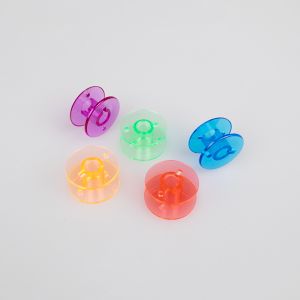 Šujmašīnas spole /  Plastmasas